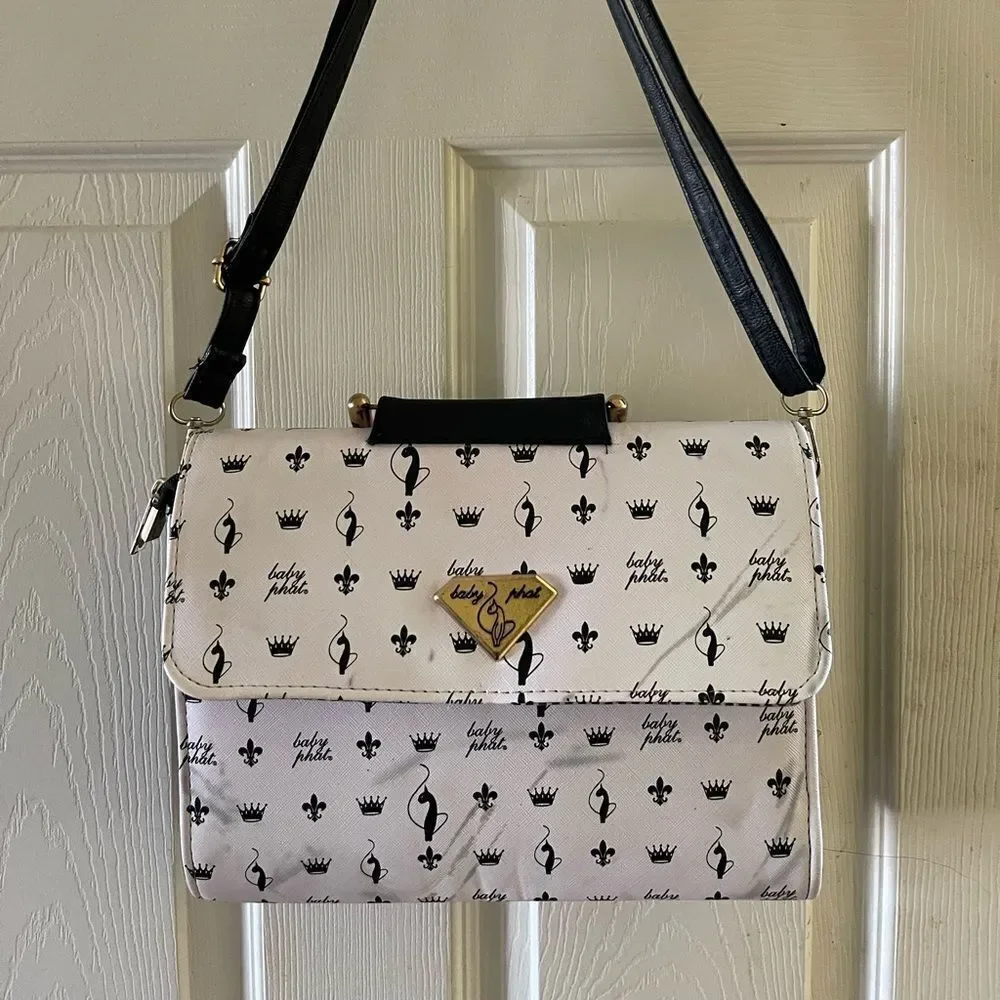Baby Phat black and white logo satchel/shoulder bag with gold tone accent.